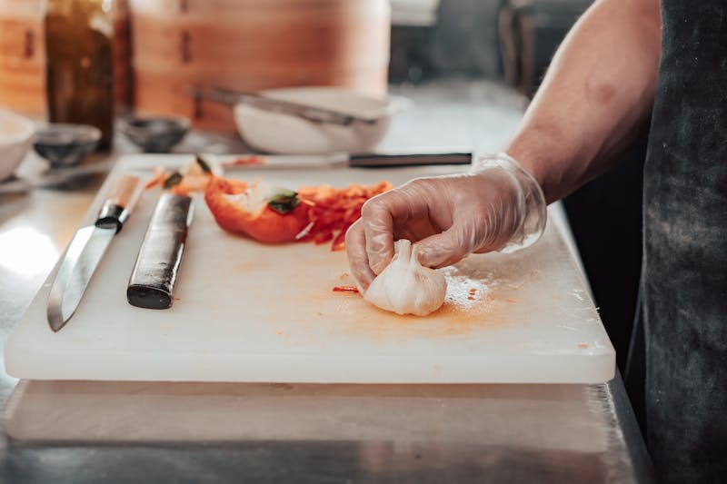Via 313 kitchen crew preparing fresh ingredients for Detroit-style pizza